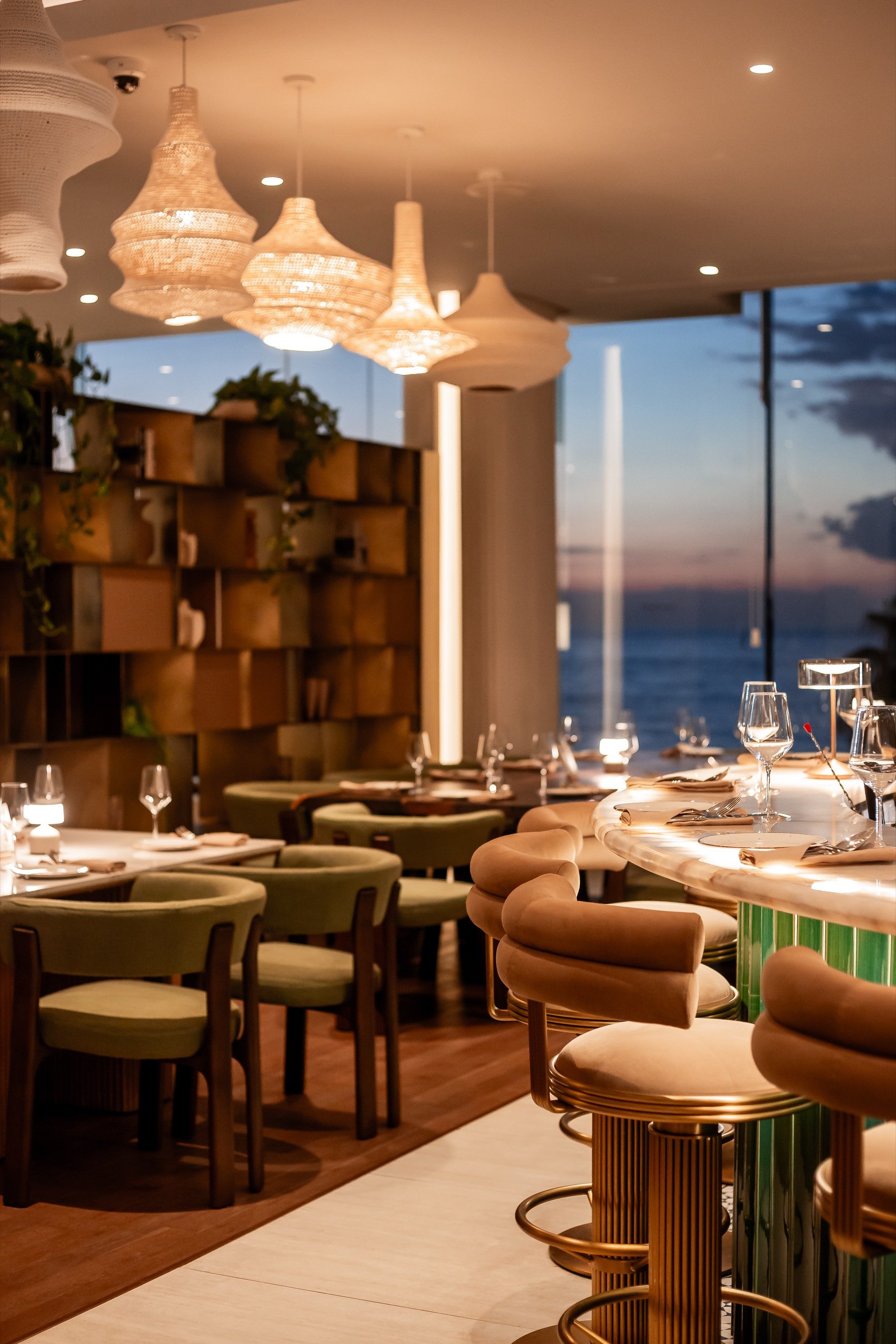 Dusk through the dining-room glass.