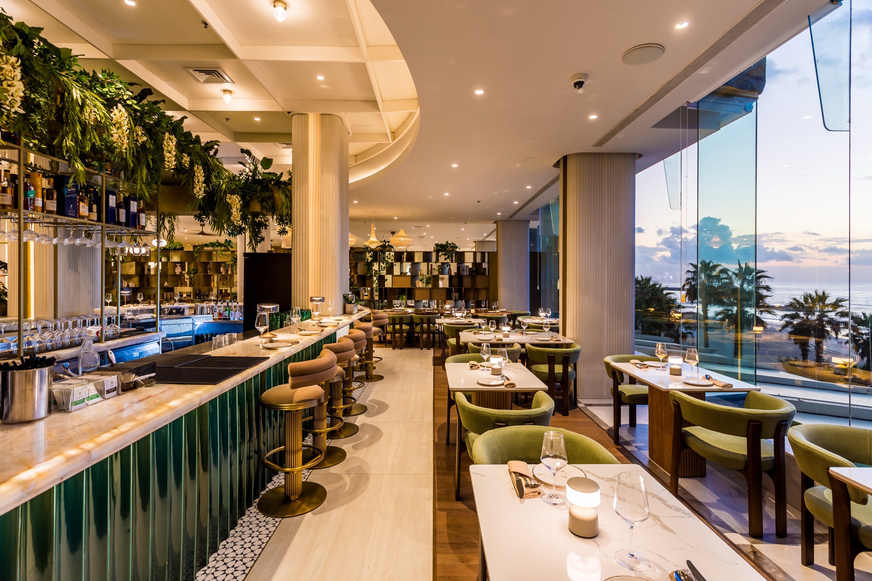 Night in the room where the bar meets the sea.