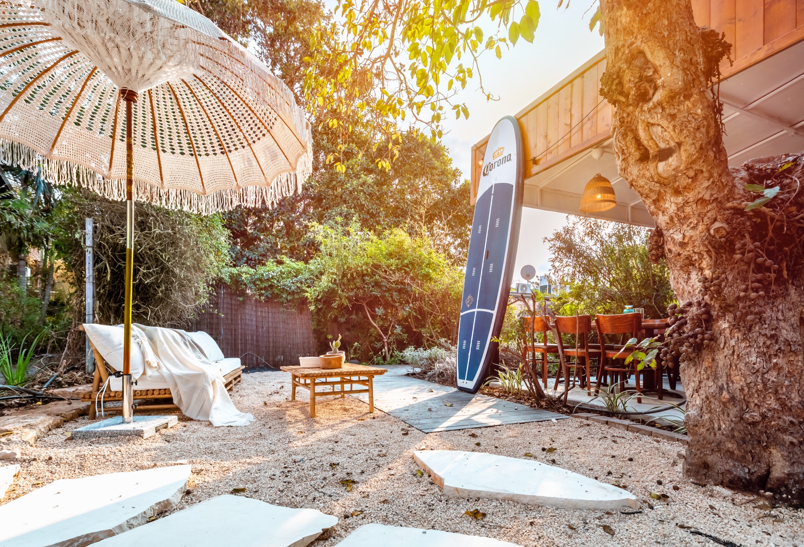 A boho courtyard holds the late light.