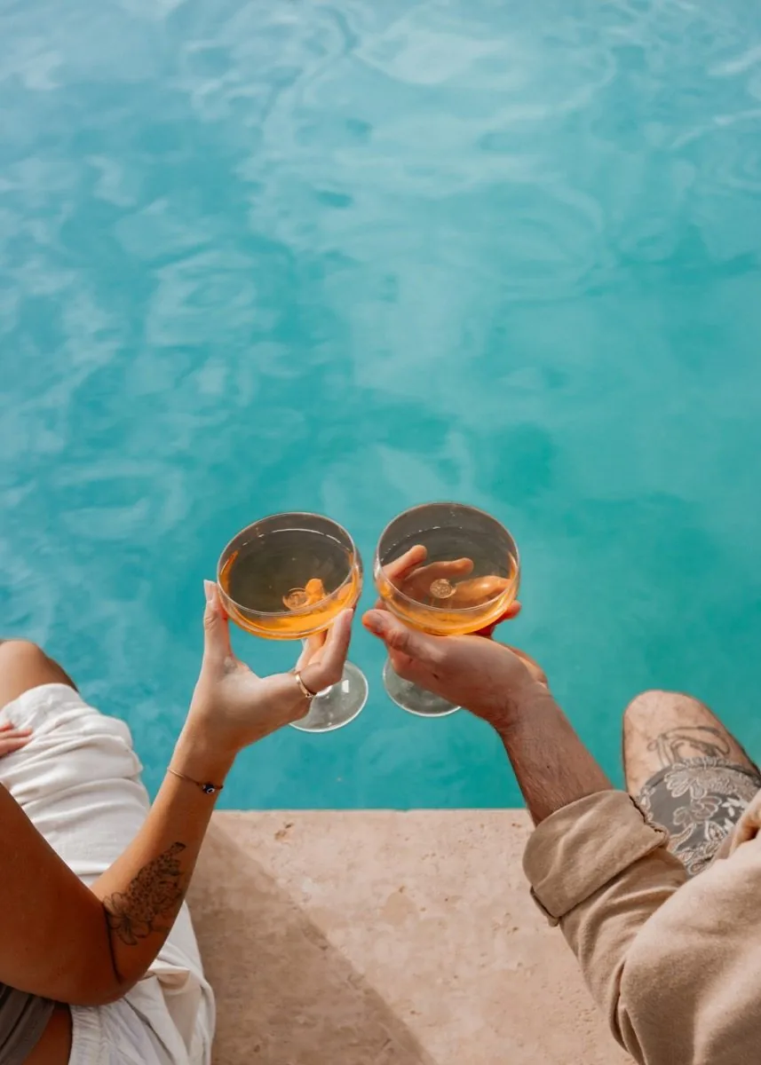 Cheers, over the pool.