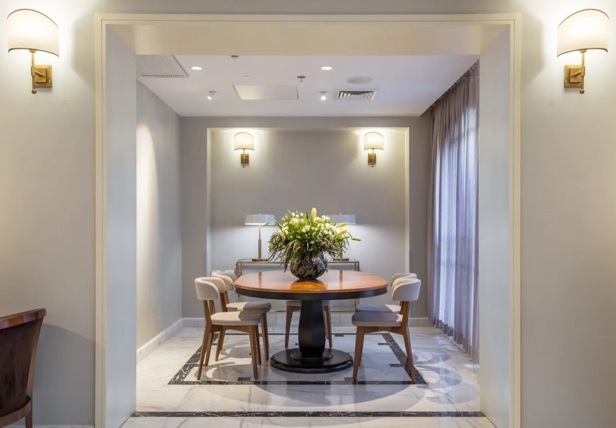 A dining room framed by its own doorway.