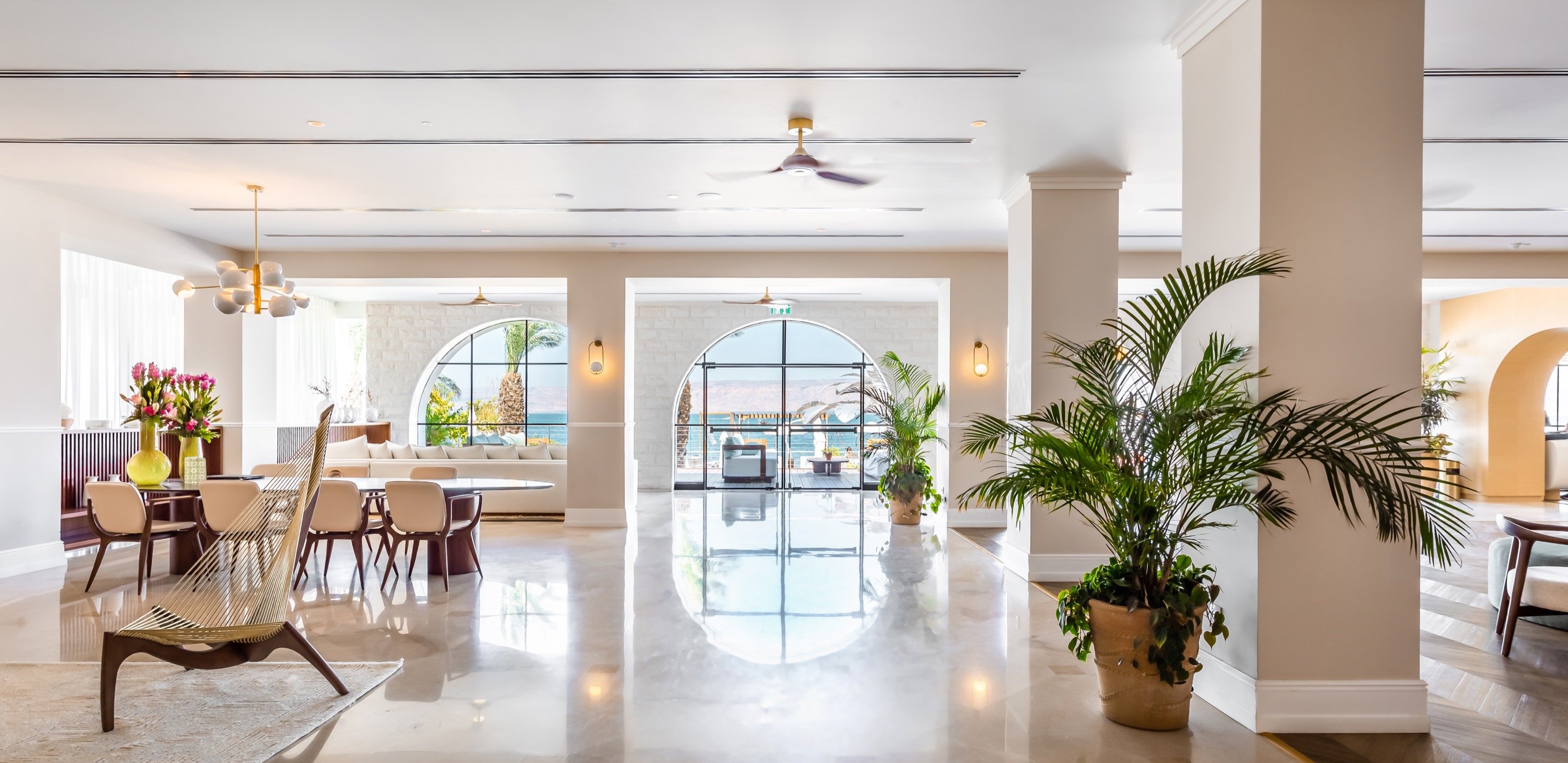 The lobby opens through stone.