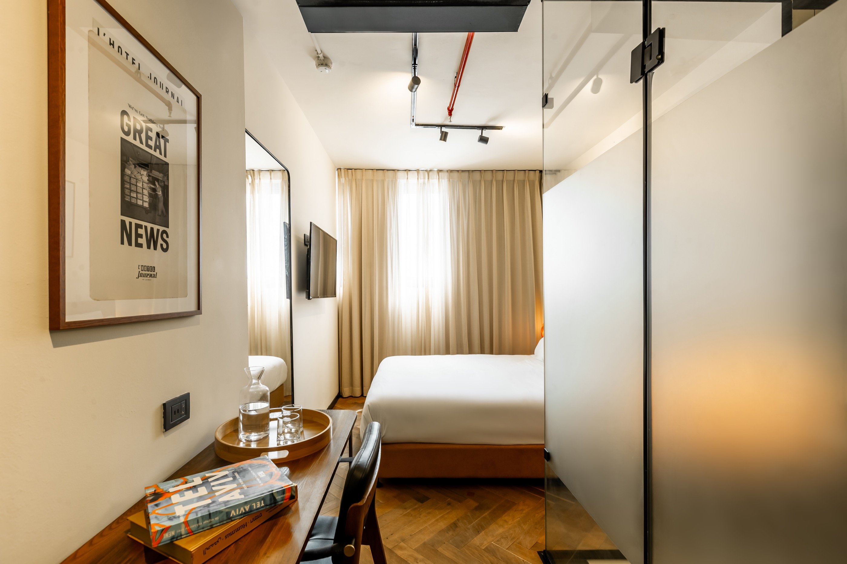 Great News on the wall — a compact room with voice.