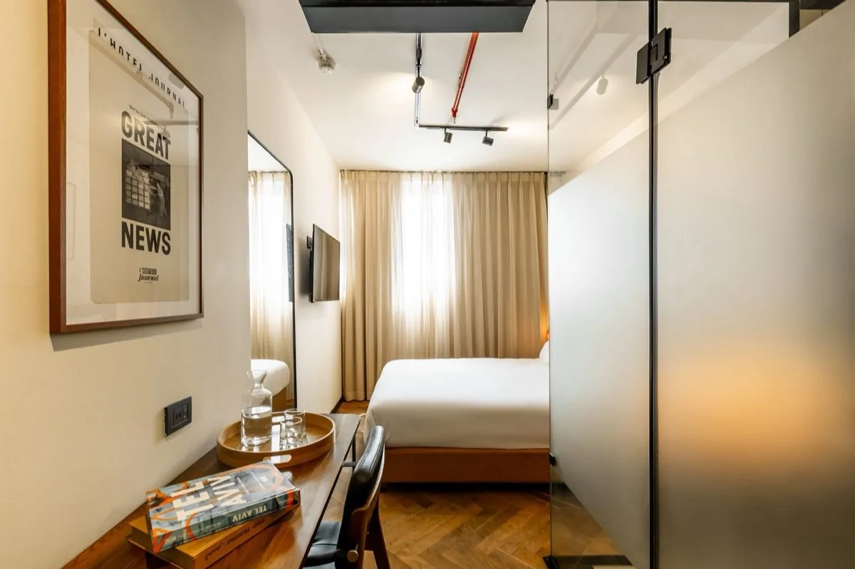 Great News on the wall — a compact room with voice.