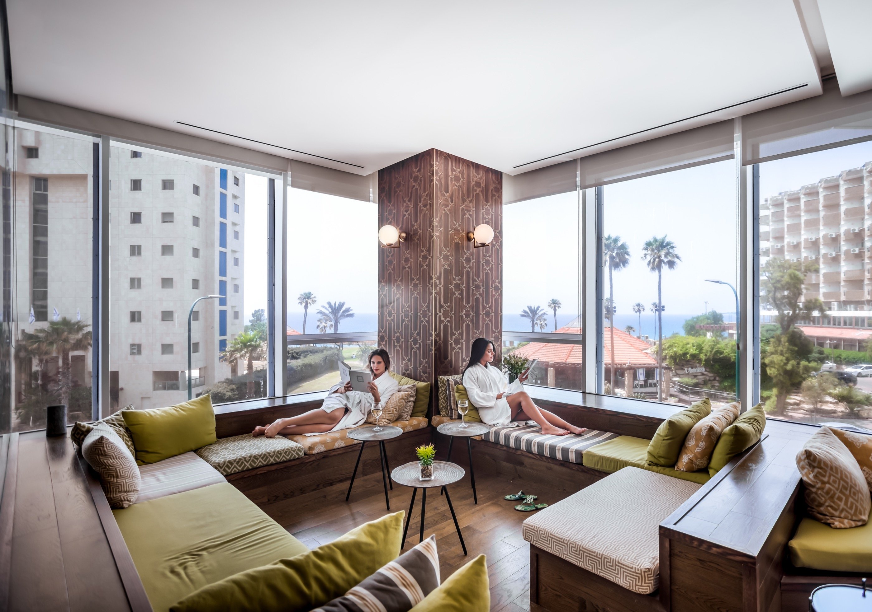 Two, a bay, the sea beyond.