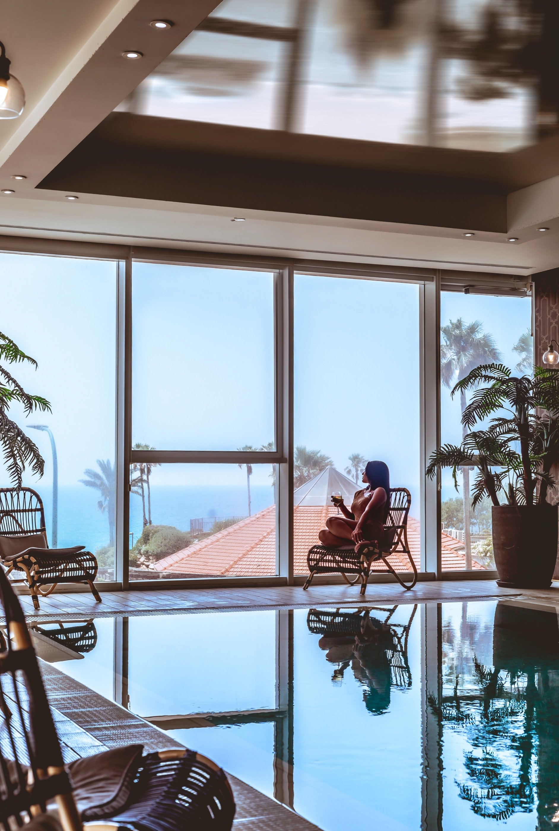 The pool looks out at the coast.