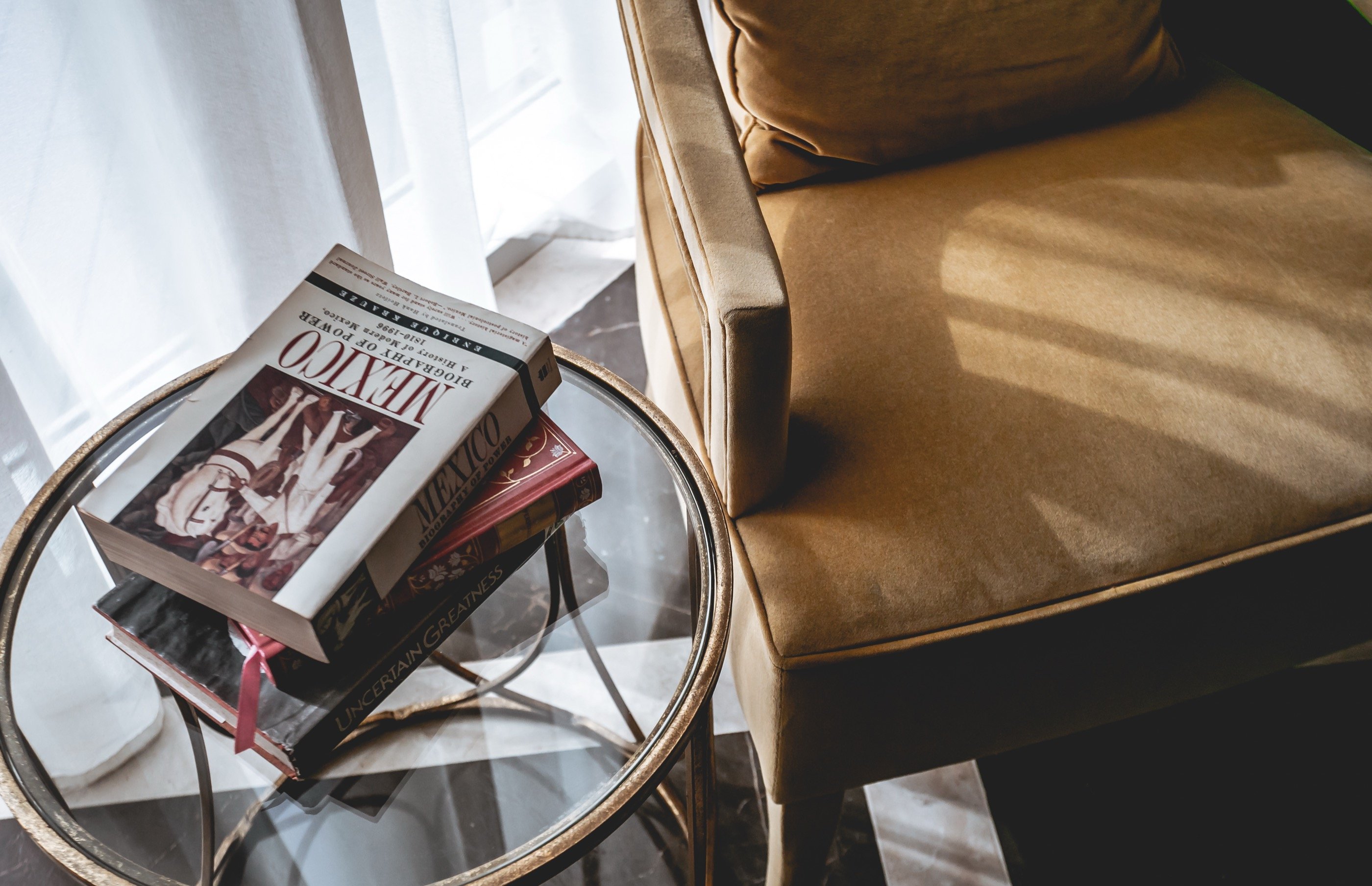 Velvet, books, late light.