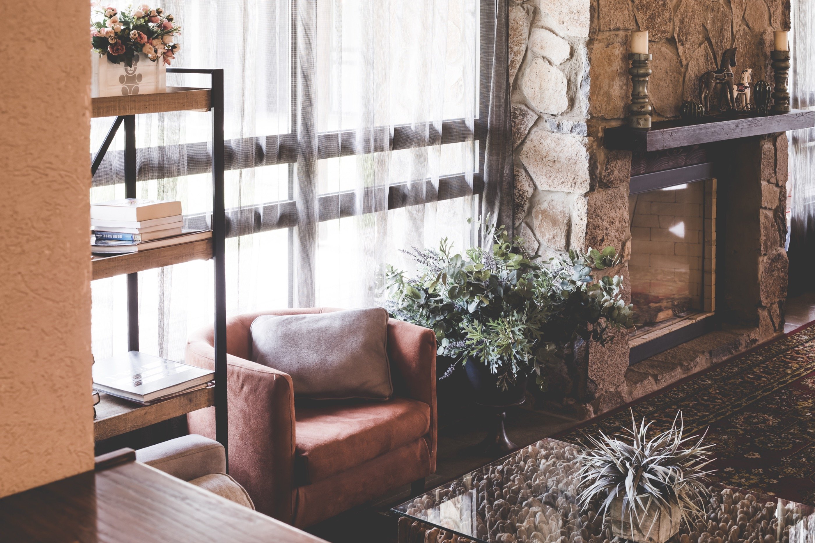 A chair by the fireplace.