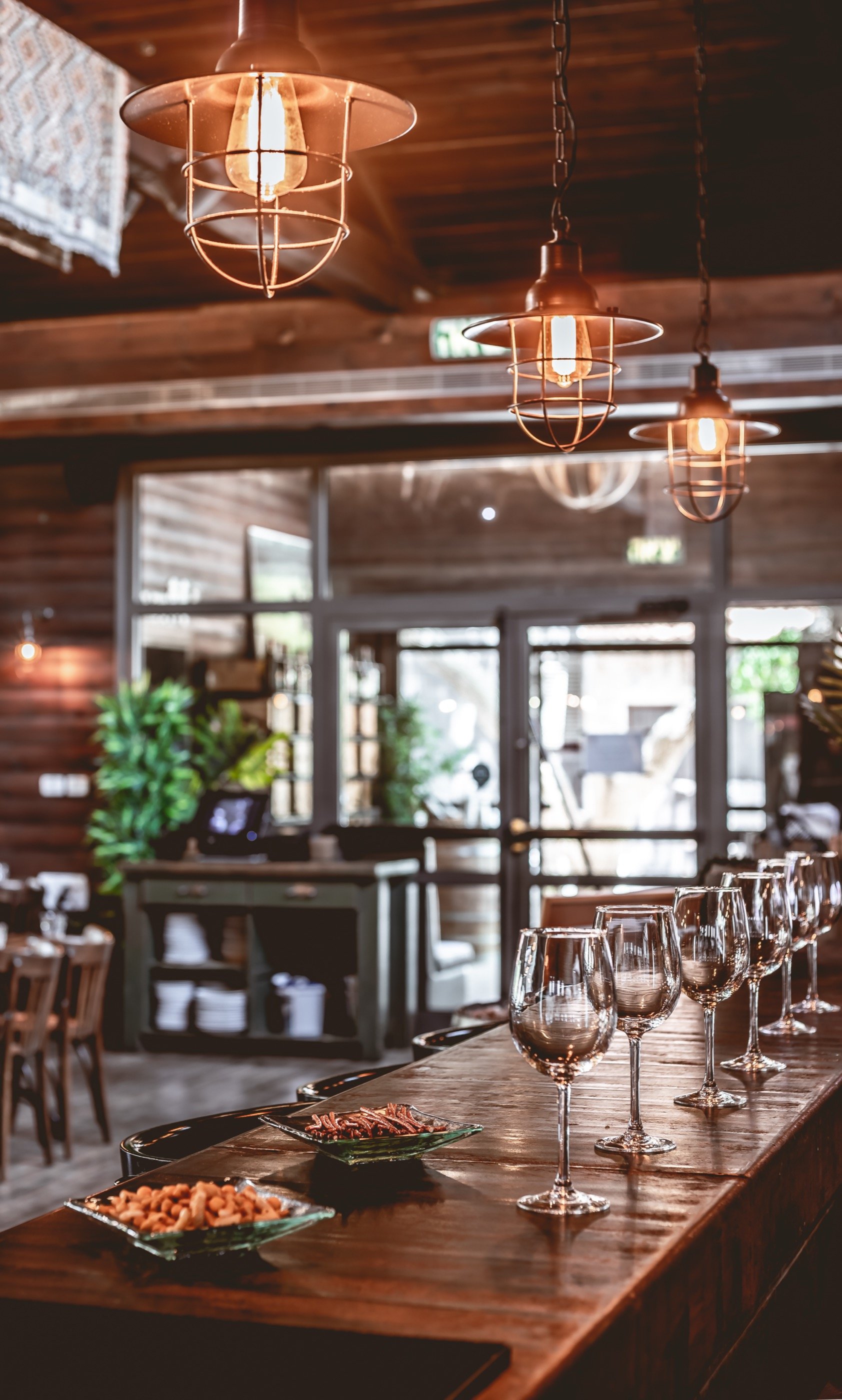 The bar, hanging-cage lights, anticipation.