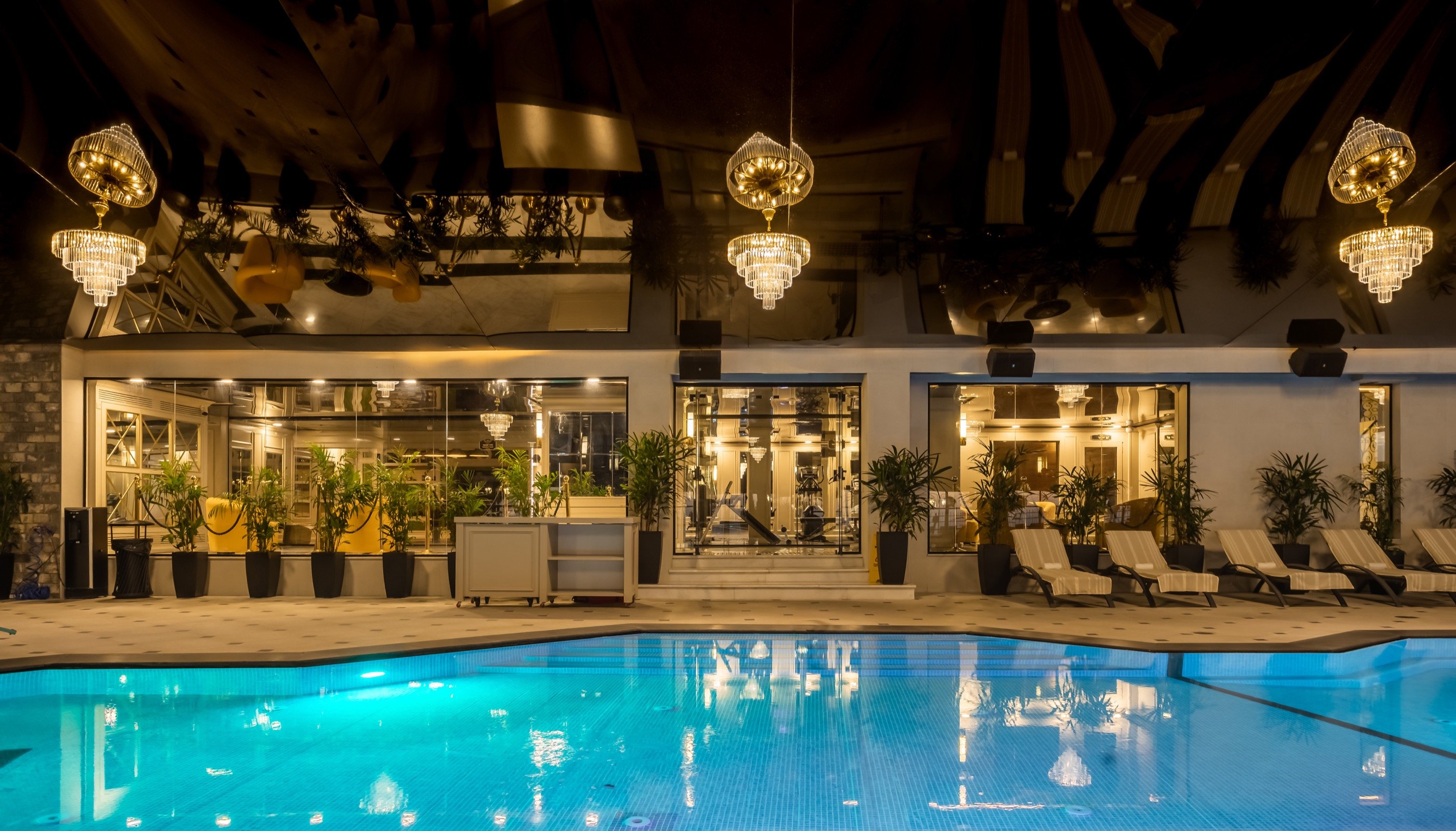 The pool holds the chandeliers.