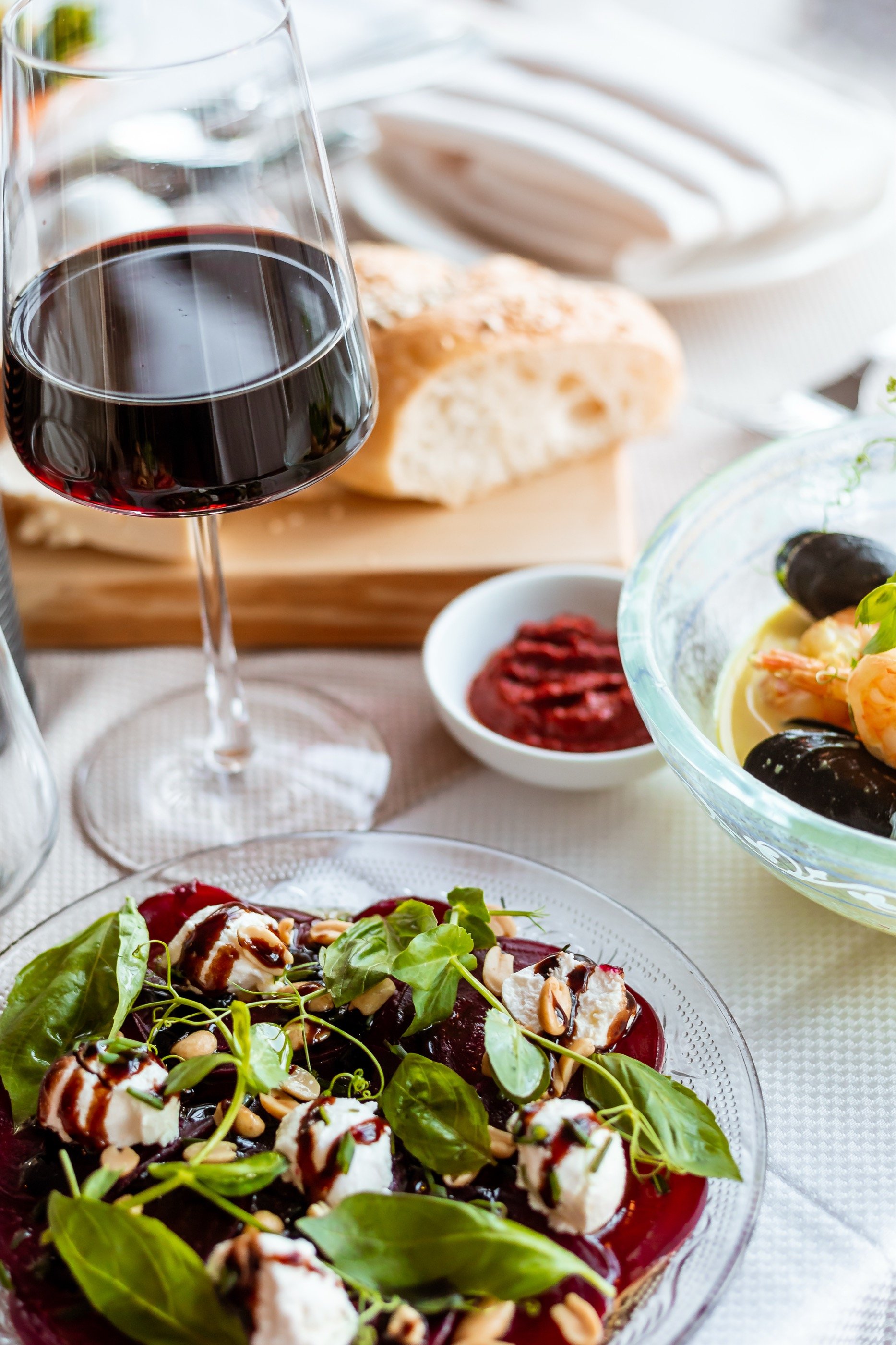 Carpaccio, olive, wine.